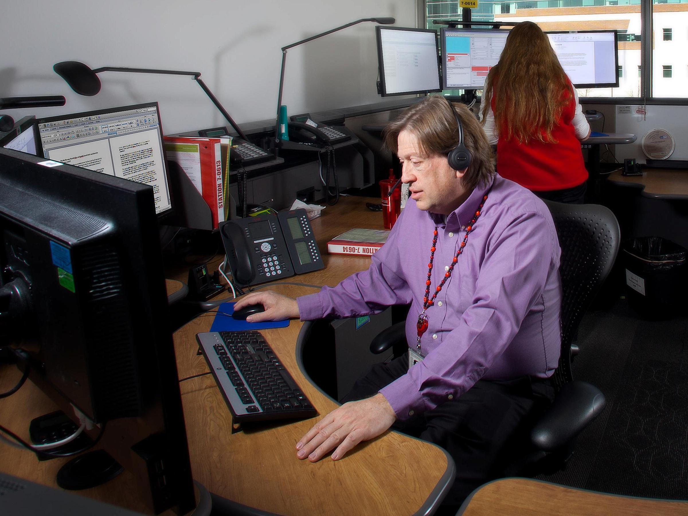 Brad in poison control call center